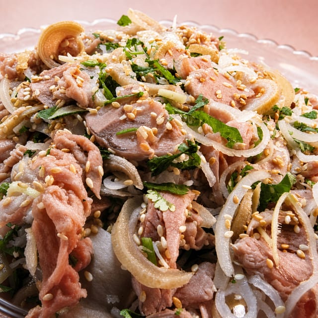 Bê Thui / Smoked Veils with Rice Powder Salad.